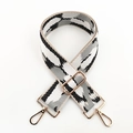 Detail of adjustable 5cm woven shoulder strap with grey camouflage pattern and gold buckles - Black White Grey