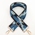 Detail of wide adjustable shoulder strap with blue wave pattern and gold metal hooks - Black Blue