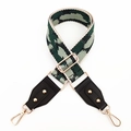 Detail of adjustable woven canvas bag strap with green geometric patterns and gold clips - Khaki Dark Green