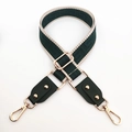 Detailed view of adjustable green woven wide shoulder strap with gold metal lobster clasps - Dark Green and Green