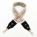 Detail of adjustable wide shoulder strap with camouflage pattern and gold hardware - Khaki Brown Gray