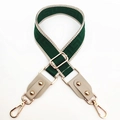 Detail of green meander jacquard bag strap with gold metal hooks and leather ends - Fruit Green and Beige Gray