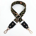 Detail of adjustable leopard print bag strap with golden hardware and leather ends - Green + Black Leather