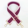 Close-up of pink and black chevron pattern wide guitar strap with gold metal buckles - Rose Pink