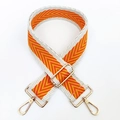 Detail of adjustable chevron strap with golden swivel hooks and bright weave pattern - Khaki-Orange Yellow