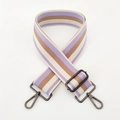 Close-up of 5cm wide striped cotton strap with dark metal swivel hooks and adjuster buckle - Purple Gunmetal Buckle