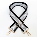 Detail of adjustable 5cm wide crossbody strap with black and white chevron pattern - Black Edge-Grey