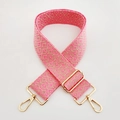 Detail of adjustable woven shoulder strap with pink geometric patterns and gold metal clasps - L11 Pink