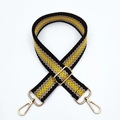 Close-up of a 3.8cm colorful woven bag strap with golden metal lobster clasps and buckles - Black and Yellow / Silver Clasp