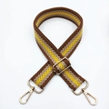 Close-up of adjustable woven strap with chevron pattern and gold metal buckles - Coffee Yellow / Silver Clasp