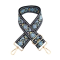 Close-up of floral embroidery pattern and gold metal buckle on a colorful woven strap - Light Blue Purple Yellow