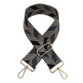 Close-up of adjustable woven shoulder strap with geometric pattern and gold buckles - Gold Buckle / A-2 Black Grey