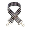 Macro view of adjustable checkered bag strap with purple-green pattern and gold hardware - Grey Green and Pink