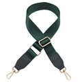 Close-up of forest green nylon strap with gold hardware and black leather connectors - Green