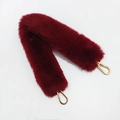 Close-up of fluffy burgundy faux fur bag strap with golden metal lobster clasps - Short Style / Burgundy