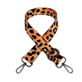 Detail of adjustable leopard print bag strap with orange webbing and black metal hooks - Light Orange + Gunmetal Buckle