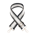 Detail of adjustable bag strap with silver stripe webbing and rose gold hooks - Dark Grey + Gold Buckle
