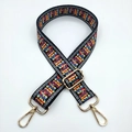 Close-up of adjustable colorful ethnic pattern shoulder strap with gold metal buckles - Rainbow Floral