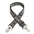 Detail of adjustable geometric jacquard strap with metal swivel hooks and buckle - Black White Grey Gunmetal Buckle