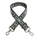 Close-up of ethnic embroidered bag strap with geometric patterns and metal buckles - Black White Green Gunmetal Buckle