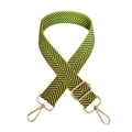 Macro shot of colorful herringbone fabric strap with golden metal lobster clasps - Yellow Green Gold Buckle