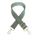 Close-up of green and white herringbone woven strap with golden adjustable metal hooks - Green White Gold Clasp