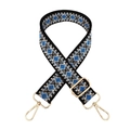 Macro detail of geometric diamond jacquard weave strap with gold hardware lobster clasps - Black Beige Blue