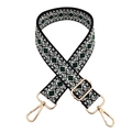 Close-up of geometric diamond pattern woven strap with polished gold metal buckles - Black and Green Mix
