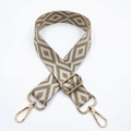 Detailed view of coffee and beige geometric diamond embroidery strap with gold hooks - Beige Base Light Khaki