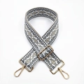 Detail of adjustable 5cm geometric jacquard strap with gold-tone metal lobster clasps - No. 14 Grey Base White