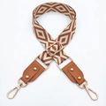 Detail showing jacquard bohemian pattern bag strap with brown PU leather and gold lobster clasp - Beige Brown