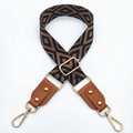 Détails de la bandoulière tissée avec cuir marron et boucles métalliques dorées - Base Noire Marron + Marron