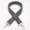 Close-up of adjustable woven shoulder strap with black and white ethnic geometric pattern - Black with White Trim