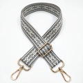 Close-up of bohemian geometric jacquard strap with adjustable gold lobster clasps - Silver Clasp / 10-Off-white