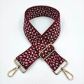 Close-up of a 5cm wide jacquard bag strap with red and black wave patterns and gold hardware - Silver Clasp / Sesame Wine Red