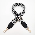 Close-up of leopard print canvas strap with gold lobster clasps and adjustable buckle - White Light Grey Leopard
