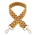 Dettaglio della tracolla larga in nylon a scacchi gialli e marroni con fibbie dorate - Quadri Beige e Giallo / Chiusura Argentata