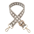 Detail of adjustable woven bag strap with geometric jacquard patterns and gold metal clips - Grey-White Square