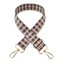 Close-up of pink and grey checkered 3.8cm wide adjustable guitar style bag strap - Grey Pink + Gold Buckle