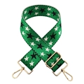 Detail of adjustable green woven strap with black and white star pattern and gold buckles - Green Base Black Star