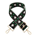 Detail of adjustable nylon bag strap featuring embroidered green and white stars - Black with White