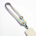 Detail of rainbow striped phone lanyard with star patterns and silver metal buckles - Pink Rainbow