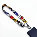 Detail of vintage license plate printed phone strap with adjustable metal buckles and hooks - Graffiti Letters