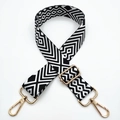 Detail of adjustable black and white geometric wide shoulder strap with gold metal hooks - Light Gold Buckle / Pattern 304
