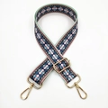 Detail of colorful ethnic geometric woven strap with gold metal swivel lobster clasps - Light Blue Edge Ethnic
