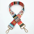 Detail of colorful ethnic pattern shoulder strap with gold metal swivel hooks and buckle - Orange Pink Circle Ethnic