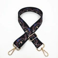 Detail of adjustable wide bag strap with colorful ethnic embroidery and gold hardware - Peacock