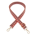 Close-up of ethnic weave 2.5cm adjustable bag strap with red wave pattern and gold hardware - Orange Pink