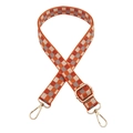 Detail of adjustable 2.5cm woven bag strap with orange checkerboard pattern and gold clasp - Orange Grey Grid