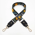 Close-up of ethnic floral strap with yellow flowers and golden metal hooks - Black Yellow Flower + Black Leather
